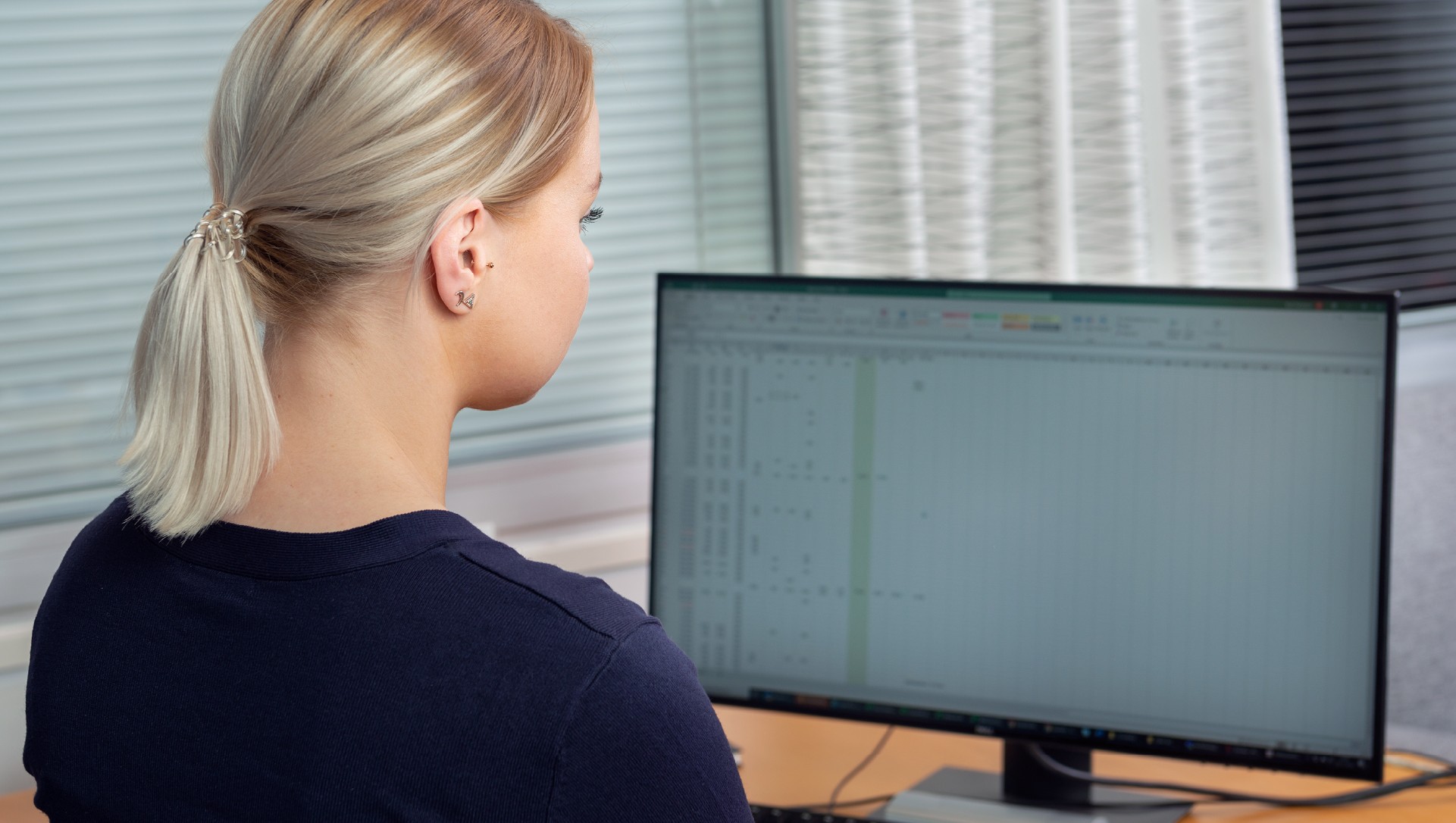 Iloinen ja osaava taloushallinnon ammattilainen